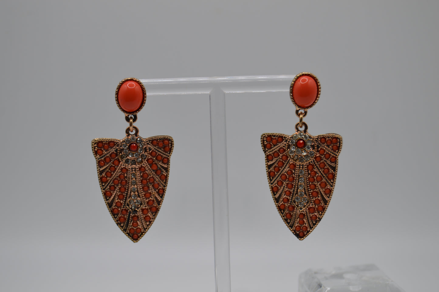 Ornate Shield Earrings – Red-Orange Bead Detailing