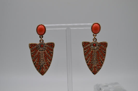 Ornate Shield Earrings – Red-Orange Bead Detailing